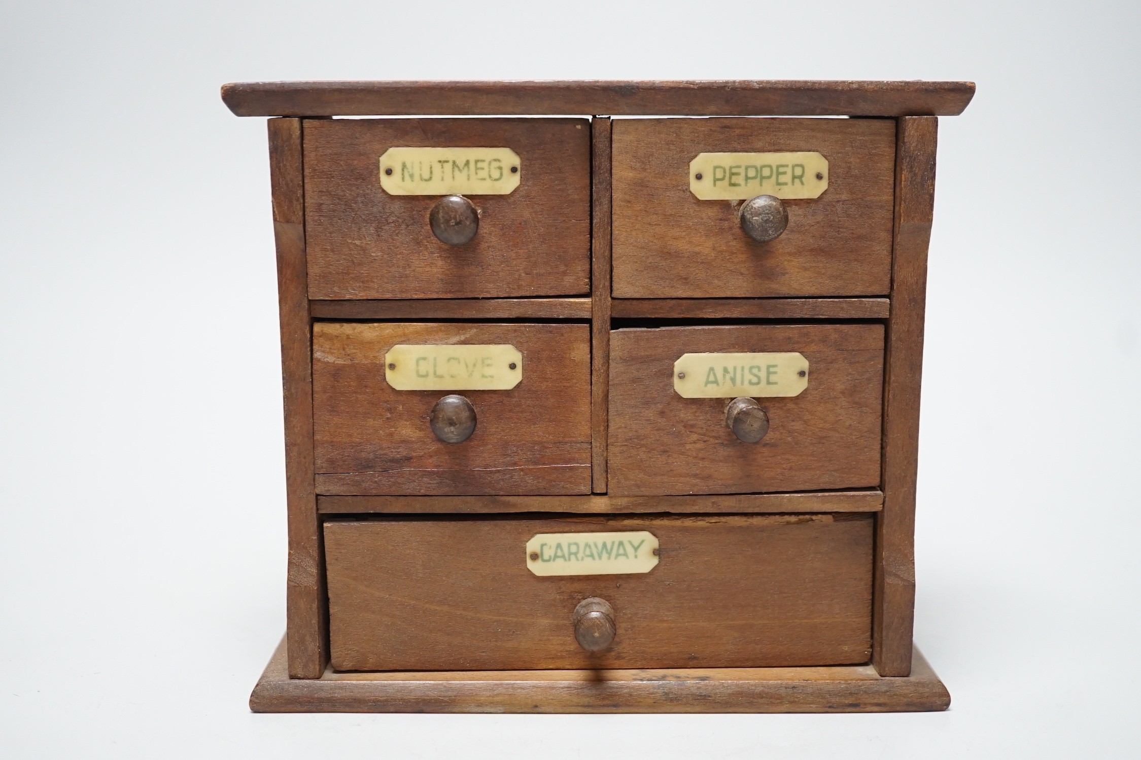 A beech and Bakelite kitchen spice cabinet, 20.5cm wide